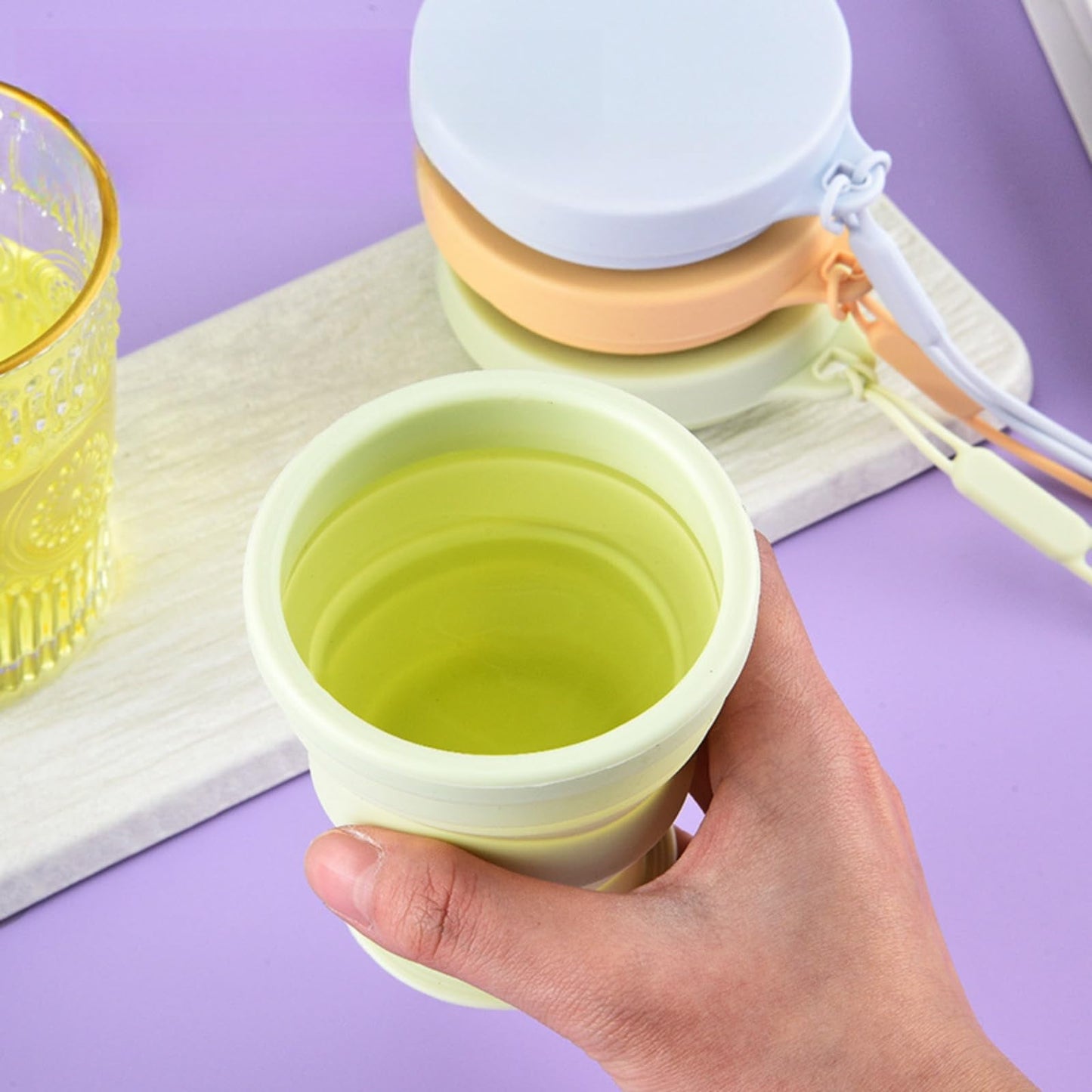 CNDRLEF Collapsible Silicone Travel Cup, Foldable Reusable Water Bottle with Carry Loop | BPA-Free Leakproof Cup for Gym, Hiking & Commute | 4 Colors (Peach, Beige, Blue, Mint)